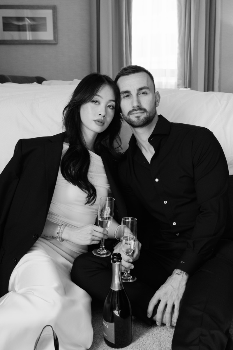 Alvina and Kai with champagne