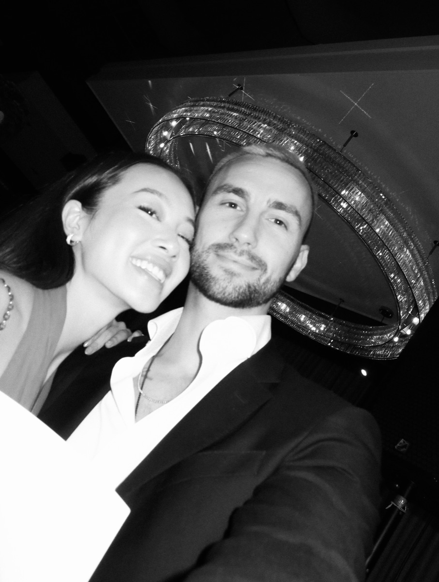 Alvina and Kai smiling together on a night out